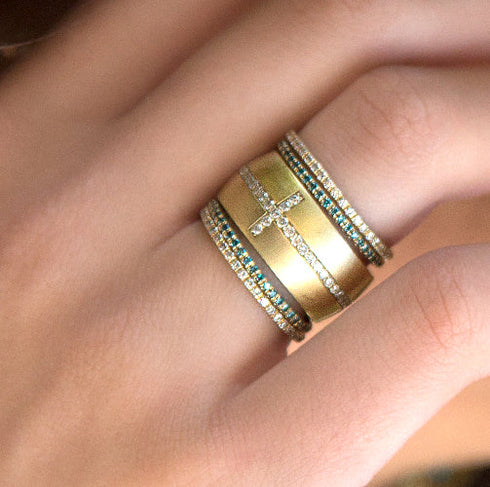 yellow gold sis, in white diamonds + emeralds,<br>with our popular diamond cross cigar band <span class='visuallyhidden'>Call or text 323-404-2959 if you need shopping assistance.</span>
